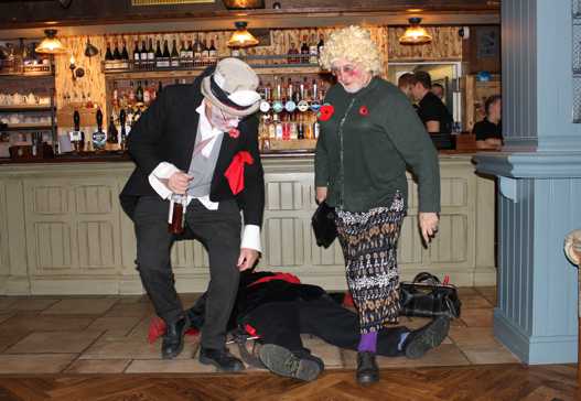 The Old Women helping the Doctor with the cure. (Photo: Duncan Broomhead)